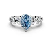 5 Stone Engagement Ring Setting for Fancy Blue Pear-Shaped Center with Graduated Accents and Prong Head in White Gold