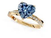 Side Accent Engagement Ring Setting for Fancy Blue Heart-Shaped Center with Accent Shoulders and Prong Head in Yellow Gold
