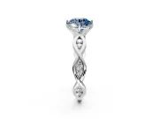 Solitaire Engagement Ring Setting for Fancy Blue Round Cut Center with Accented Twist Band and Leaf Prong Head in Sterling Silver