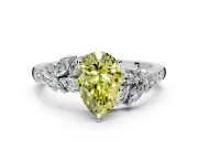 Solitaire Engagement Ring Setting for Fancy Yellow Pear-Shaped Center with Marquise Accent Twist Band and Prong Head in Platinum