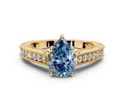 Solitaire Engagement Ring Setting for Fancy Blue Pear-Shaped Center with Engraved Pave Band and Prong Head in Yellow Gold