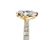 Solitaire Engagement Ring Setting for Pear-Shaped Center with Pave Band and Claw Prong Head in Yellow Gold