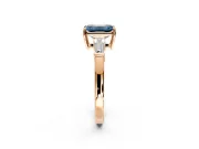 3 Stone Engagement Ring Setting for Fancy Blue Emerald Cut Center with Baguette Accents and Prong Head in Rose Gold
