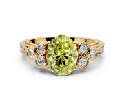 Cluster Engagement Ring Setting for Fancy Yellow Oval Center with Bezel Accent Clusters and Prong Head in Yellow Gold