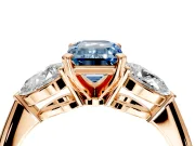 3 Stone Engagement Ring Setting for Fancy Blue Emerald Cut Center with Large Pear-Shaped Accents and Prong Head in Rose Gold