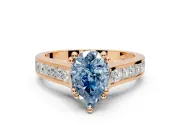 Solitaire Engagement Ring Setting for Fancy Blue Pear-Shaped Center with Channel Band and Double Claw Prong Head in Rose Gold