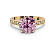 Solitaire Engagement Ring Setting for Fancy Pink Round Cut Center with Channel-Set Accent Band and Prong Head in Yellow Gold