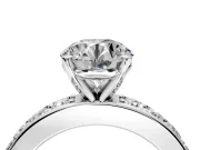 Solitaire Engagement Ring Setting for Round Cut Center with Channel-Set Accents and Prong Head in White Gold