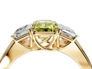 3 Stone Engagement Ring Setting for Fancy Yellow Emerald Cut Center with Raised Basket Heads and Prong Head in Yellow Gold