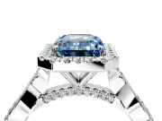 Halo Engagement Ring Setting for Fancy Blue Emerald Cut Center with Twist Band and Prong Head in Platinum