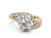 Solitaire Engagement Ring Setting for Radiant Cut Center with Pave Bypass Twist Band and Prong Head in Yellow Gold