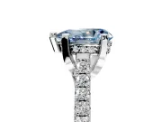 Solitaire Engagement Ring Setting for Fancy Blue Pear-Shaped Center with Widening Pave Band and Claw Prong Head in Sterling Silver