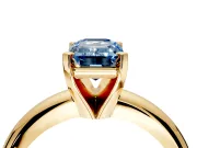Solitaire Engagement Ring Setting for Fancy Blue Emerald Cut Center with Wire Band and Prong Head in Yellow Gold