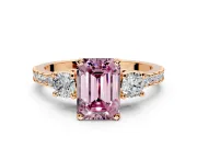 3 Stone Engagement Ring Setting for Fancy Pink Emerald Cut Center with Round Cut Side Accents and Prong Head in Rose Gold