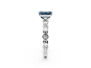 Solitaire Engagement Ring Setting for Fancy Blue Emerald Cut Center with Beaded Bezel Station Band and Prong Head in White Gold