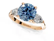 3 Stone Engagement Ring Setting for Fancy Blue Round Cut Center with Large Pear-Shaped Accents and Prong Head in Rose Gold