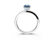 Solitaire Engagement Ring Setting for Fancy Blue Emerald Cut Center with Round Cut Pave Band and Prong Head in White Gold