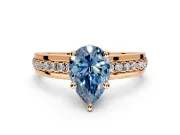 Solitaire Engagement Ring Setting for Fancy Blue Pear-Shaped Center with Raised Channel Band and Prong Head in Rose Gold