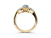 3 Stone Engagement Ring Setting for Fancy Blue Pear-Shaped Center with Large Pear-Shaped Accents and Prong Head in Yellow Gold