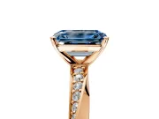 Side Accent Engagement Ring Setting for Fancy Blue Emerald Cut Center with Accent Shoulders and Prong Head in Rose Gold