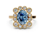 Cluster Halo Engagement Ring Setting for Fancy Blue Oval Center with Milgrain Bezel Accents and Prong Head in Yellow Gold