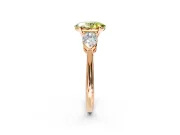3 Stone Engagement Ring Setting for Fancy Yellow Oval Center with Large Pear-Shaped Accents and Prong Head in Rose Gold