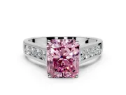 Solitaire Engagement Ring Setting for Fancy Pink Radiant Cut Center with Round Cut Channel Band and Prong Head in Platinum