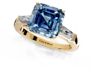 3 Stone Engagement Ring Setting for Fancy Blue Asscher Cut Center with Tapered Baguettes, Plain Band and Prong Head in Yellow Gold