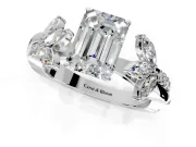 Floral Engagement Ring Setting for Emerald Cut Center with Trailing Marquise Accents and Prong Head in White Gold