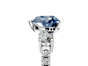 3 Stone Engagement Ring Setting for Fancy Blue Heart-Shaped Center with Round Cut Side Accents and Prong Head in White Gold