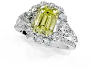 Halo Engagement Ring Setting for Fancy Yellow Emerald Cut Center with Two-Strand Split Shank and Prong Head in Platinum