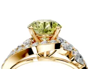 Halo Engagement Ring Setting for Fancy Yellow Round Cut Center with Marquise and Pave Bypass Band and Prong Head in Yellow Gold