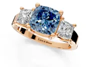 3 Stone Engagement Ring Setting for Fancy Blue Cushion Cut Center with Matching Side Accents and Prong Head in Rose Gold