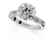 Solitaire Engagement Ring Setting for Round Cut Center with Channel Baguette Band and Prong Head in Platinum