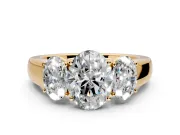 3 Stone Engagement Ring Setting for Oval Center with Raised Basket Heads and Prong Head in Yellow Gold