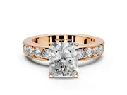 Solitaire Engagement Ring Setting for Radiant Cut Center with Channel-Set Accents and Prong Head in Rose Gold