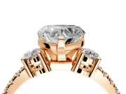 3 Stone Engagement Ring Setting for Heart-Shaped Center with Round Cut Side Accents and Prong Head in Rose Gold