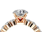 Shared-Prong Engagement Ring Setting for Round Cut Center with Graduated Accents and Prong Head in Rose Gold