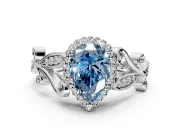 Halo Engagement Ring Setting for Fancy Blue Pear-Shaped Center with Leaf Motif Split Shank and Prong Head in White Gold