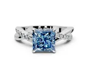 Solitaire Engagement Ring Setting for Fancy Blue Princess Cut Center with Half-Pave Crossover Band and Prong Head in Platinum