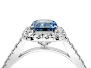 Halo Engagement Ring Setting for Fancy Blue Emerald Cut Center with Narrowing Pave Band and Prong Head in Platinum