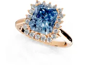 Starburst Halo Engagement Ring Setting for Fancy Blue Radiant Cut Center with Thin Round-Wire Band and Prong Head in Rose Gold