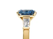 3 Stone Engagement Ring Setting for Fancy Blue Emerald Cut Center with Channel Baguette Accents and Prong Head in Yellow Gold