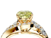 Halo Engagement Ring Setting for Fancy Yellow Cushion Cut Center with Marquise and Pave Bypass Band and Prong Head in Yellow Gold