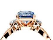 3 Stone Engagement Ring Setting for Fancy Blue Radiant Cut Center with Pave Twist Band and Prong Head in Rose Gold