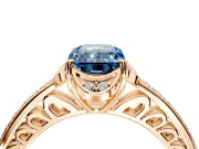 Floral Engagement Ring Setting for Fancy Blue Emerald Cut Center with Four Accent Clusters and Prong Head in Rose Gold