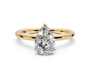 Low-Set Solitaire Engagement Ring Setting for Pear-Shaped Center with Thin Plain Band and Prong Head in Yellow Gold