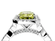 Halo Engagement Ring Setting for Fancy Yellow Emerald Cut Center with Twist Band and Prong Head in White Gold