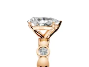 Solitaire Engagement Ring Setting for Pear-Shaped Center with Beaded Bezel Station Band and Prong Head in Rose Gold