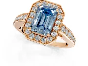 Bezel-Framed Halo Engagement Ring Setting for Fancy Blue Emerald Cut Center with Pave Band and Prong Head in Rose Gold